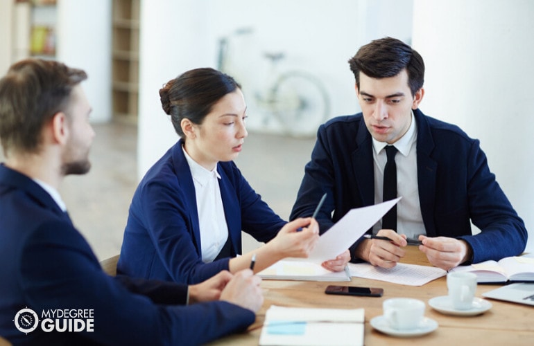 policy analysts in meeting