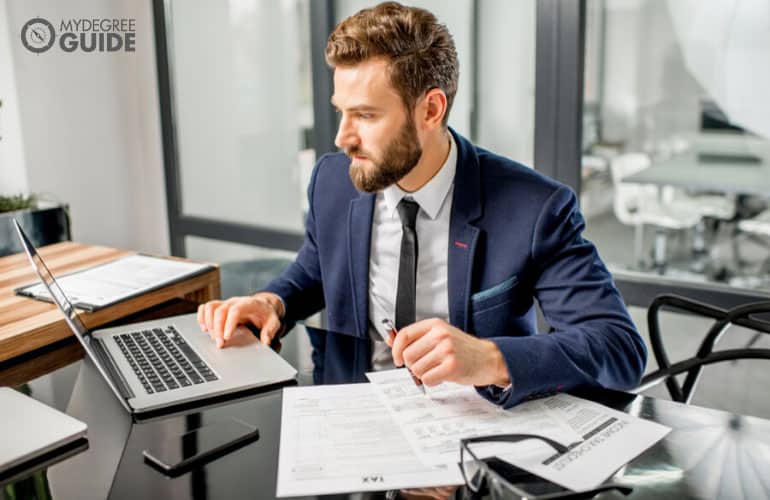 male accountant working on tax