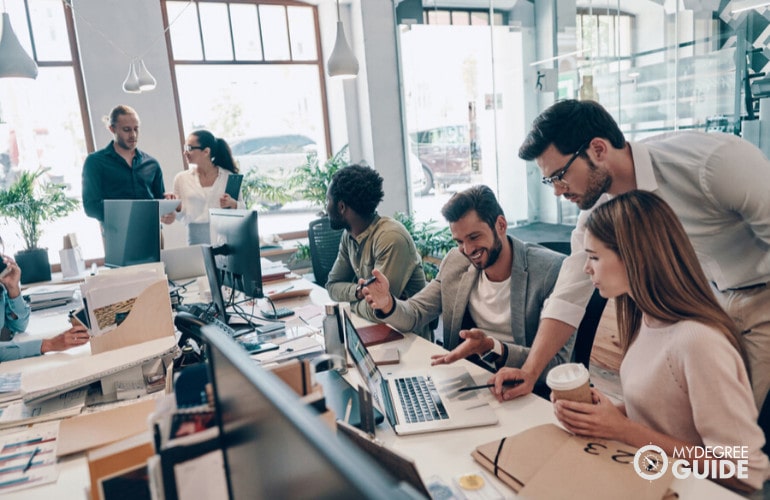 team of data analysts working in an office