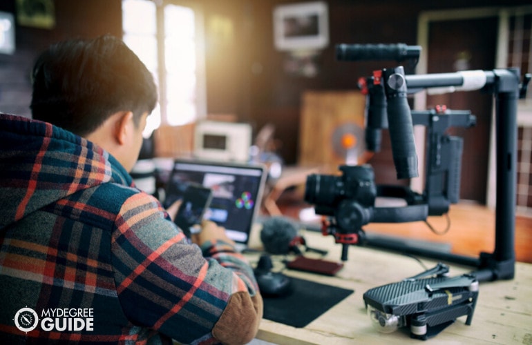 film maker working in an office