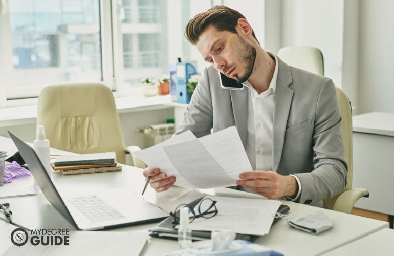 Man preparing requirements for Masters in Web Development