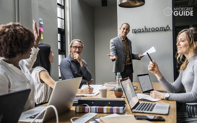 employees having a staff meeting