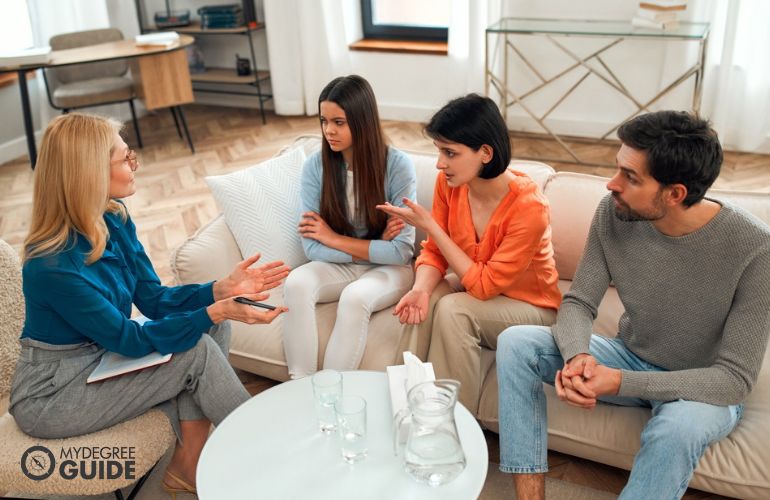 people talking around a table