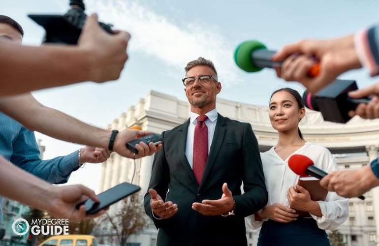 man having a press interview