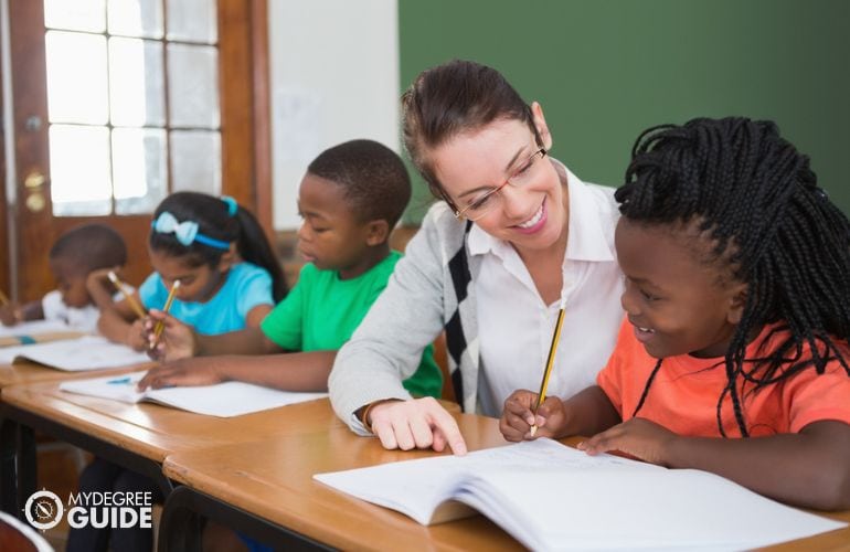 teacher doing school activity with students