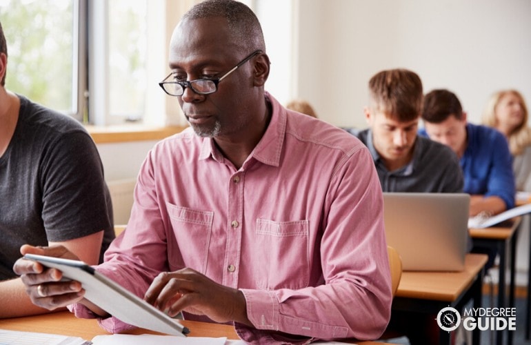 PhD in Psychology students attending a class in university