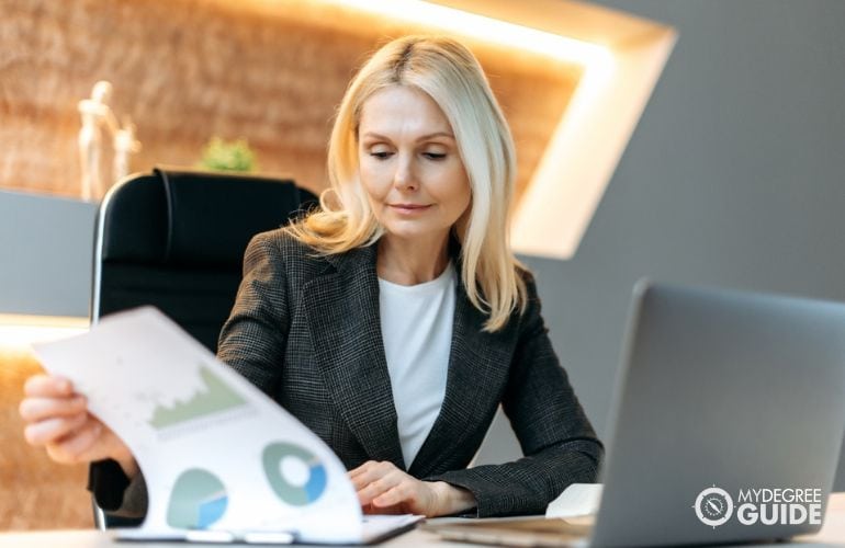 financial manager reviewing documents