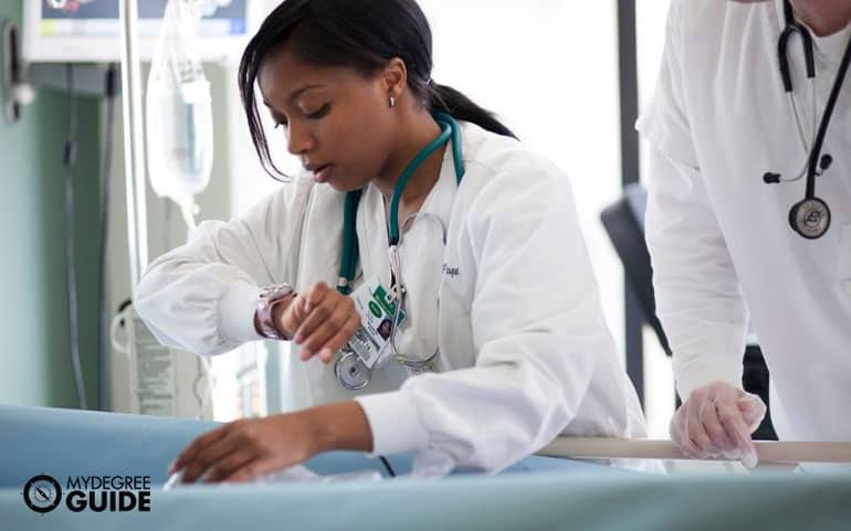 female doctor practicing medicine