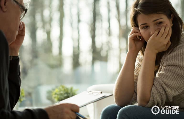 counselor and his patient in an office