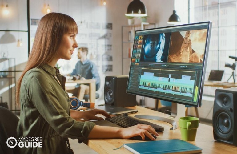 Multimedia Artist working on animations on her computer