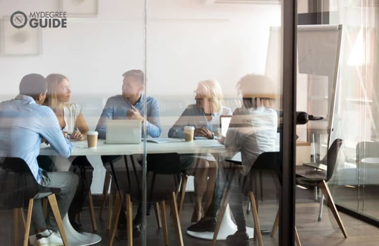 team of professionals in a non-profit organization having a meeting