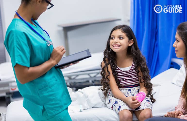 nurse checking on a patient