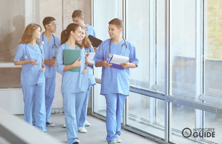 students in hall of university indoors