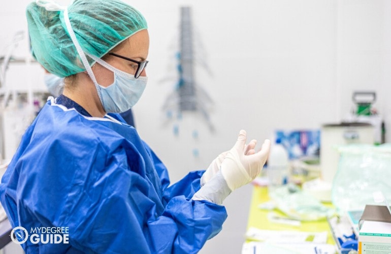 nurse preparing for duty in a hospital