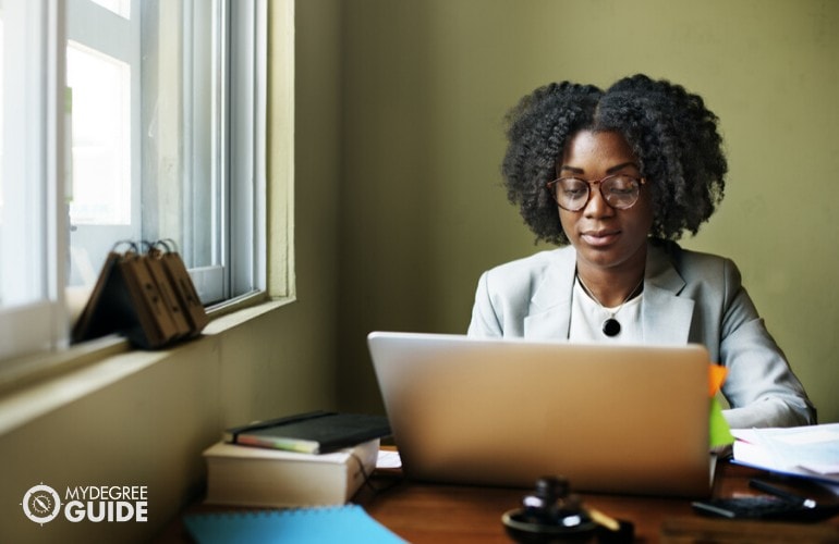 nutritionist working on her laptop