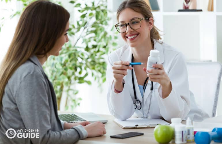 a registered dietician introducing a supplement to a patient