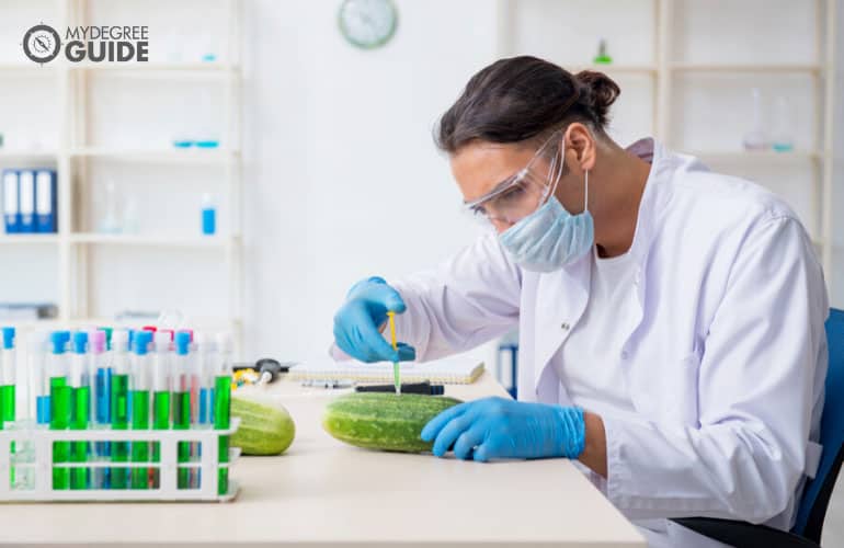 nutritional scientist examining fruit