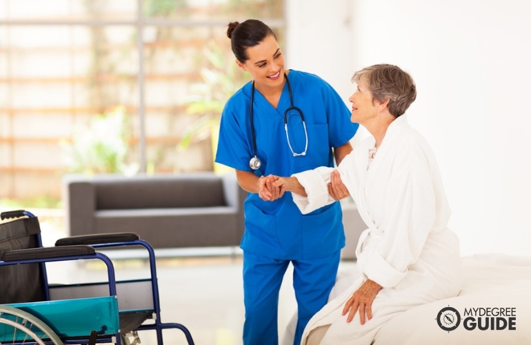 nurse taking care of an elderly woman