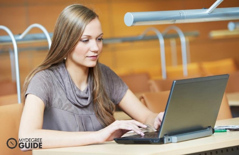 Addiction Counselor student studying on her laptop