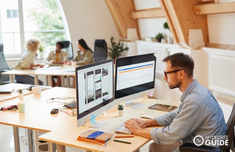 graphics programmer working in his office