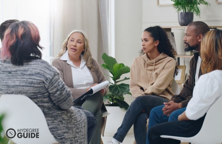 Occupational Scientist engaging with a group of patients