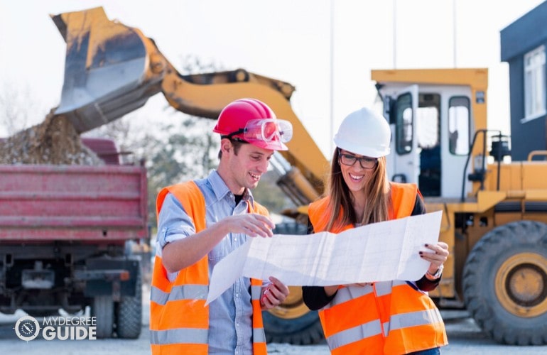 Civil Engineers looking at a construction plan