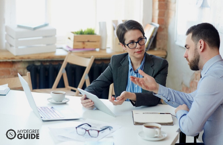 Human Resources Manager working with a colleague