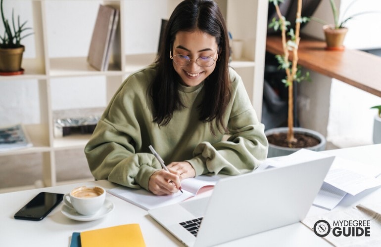 Engineering student studying online at home