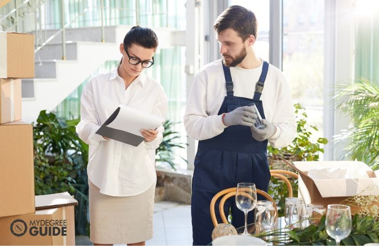 Event planner reviewing her tasks checklist