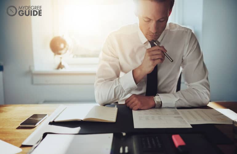 male employee working on finance department