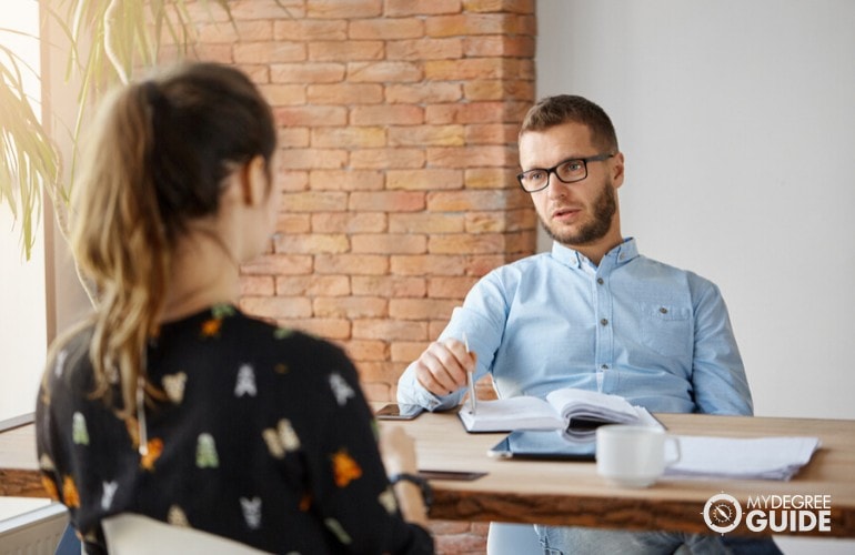 Human Resources Manager interviewing an applicant