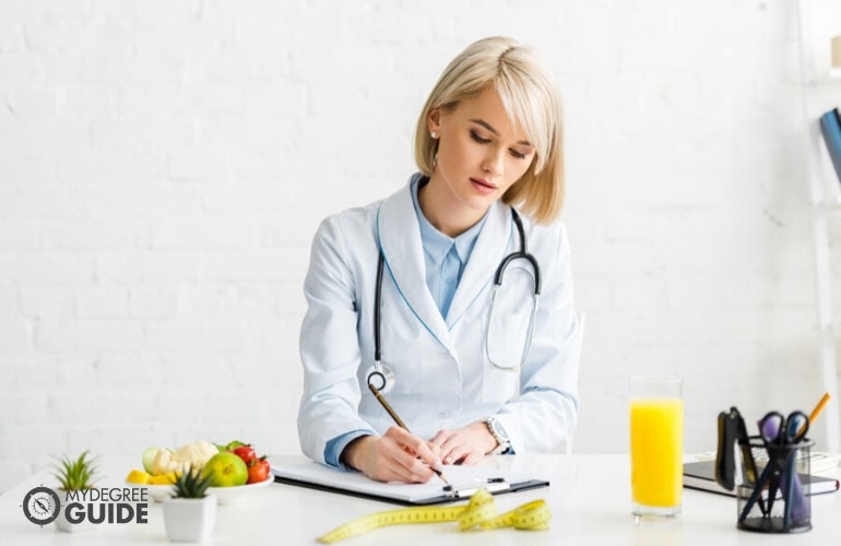 nutritionist working in her office