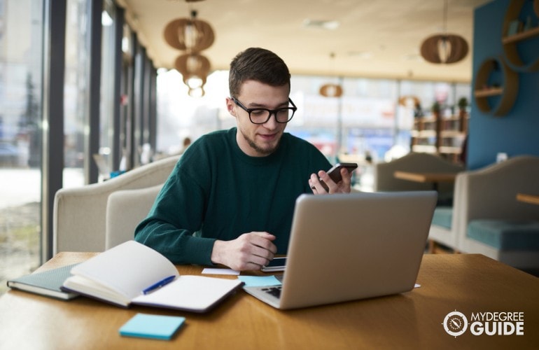 Bachelor’s in Mathematics student studying in a cafe