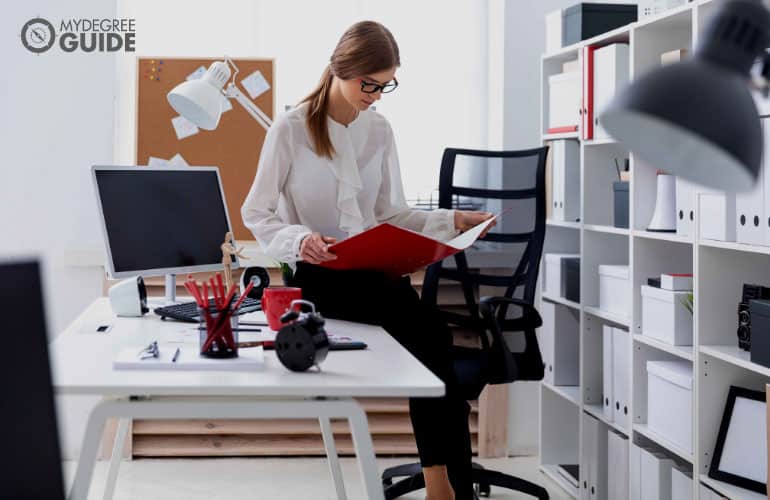 female social worker reviewing a portfolio