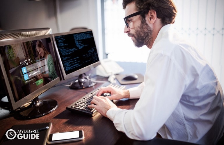 Web Developer working in his office