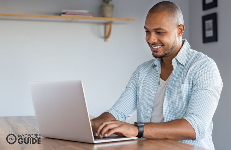 Man taking Online PhD in Environmental Management