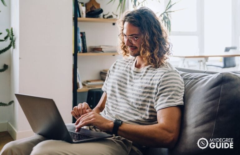 Man taking Online Physical Therapy Assistant 