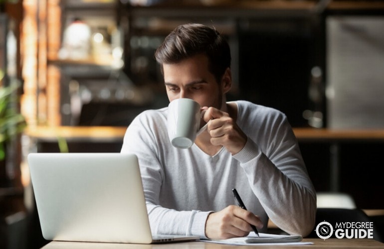 psychology student studying at cafe