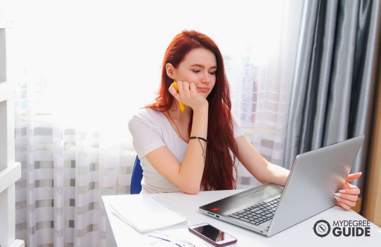 psychology student studying online at home