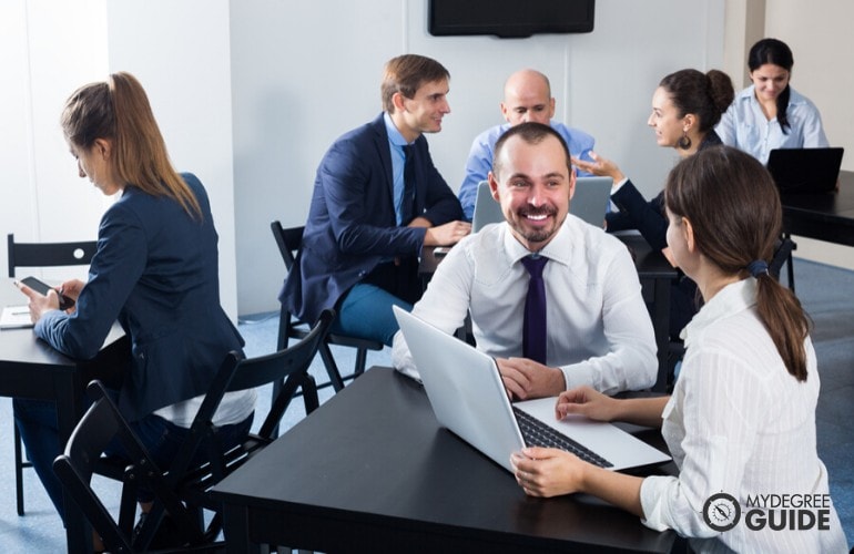 Human Resources Managers meeting at a conference