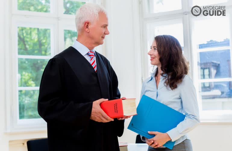 lawyer and paralegal in an office