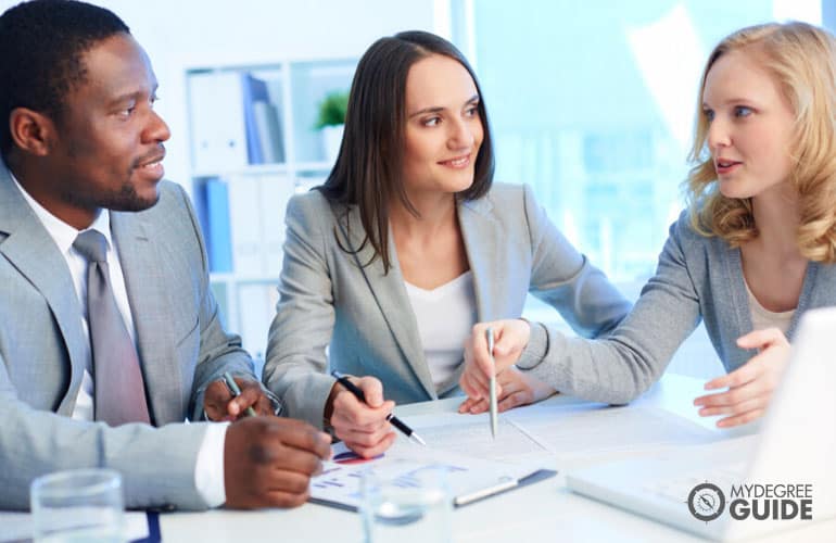 financial managers discussing in a meeting