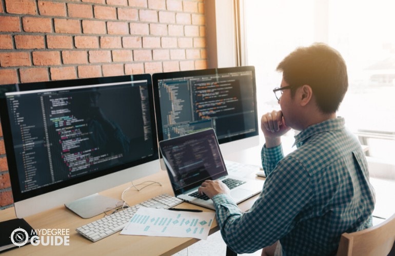 web developer working in his office