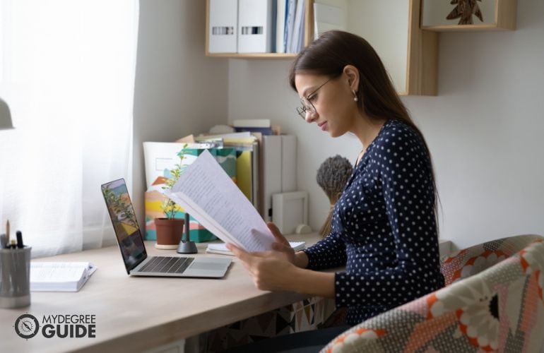 Woman preparing requirements for Physical Therapy Aide Certification 