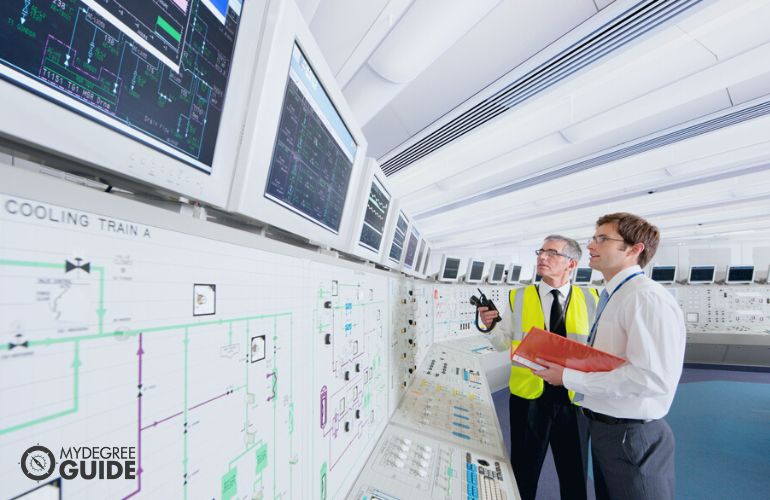 Nuclear Engineers working in the control room