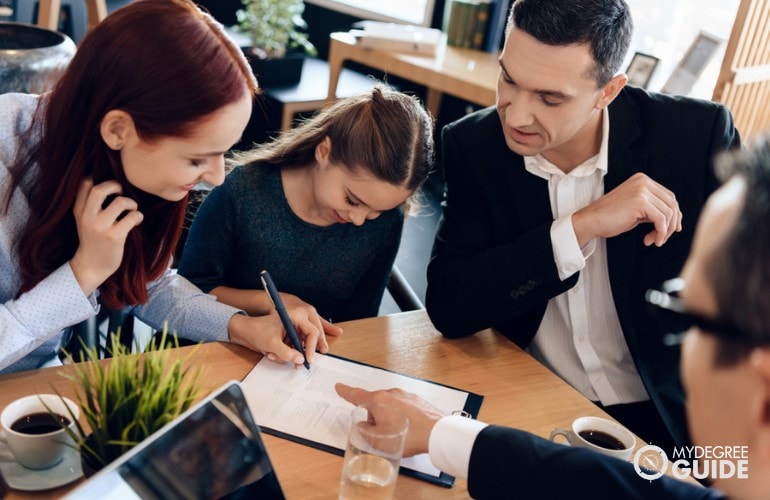 lawyer meeting with clients