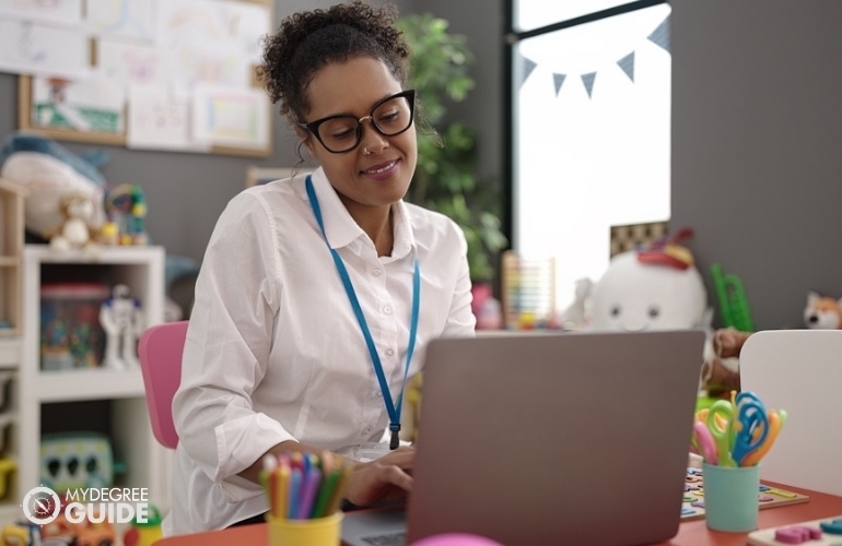 Preschool Director working on her laptop