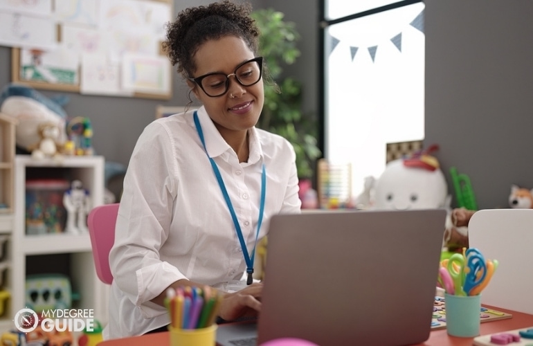 Preschool Director working on her laptop