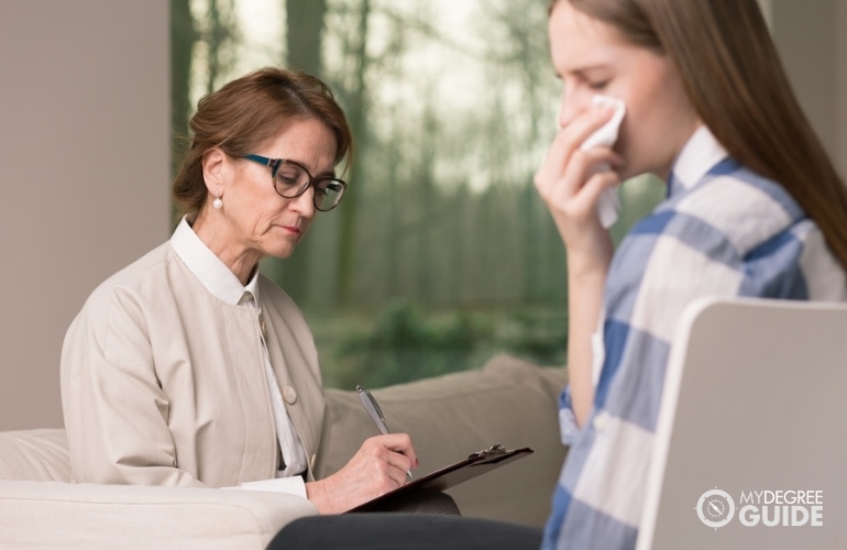 probation officer listening to a woman