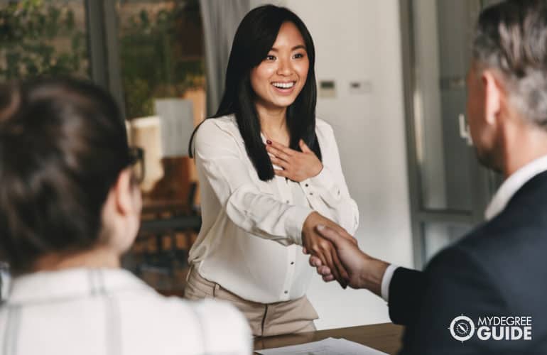 shaking hands after interview